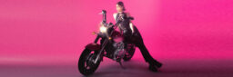 Monnie on a motorbike.
